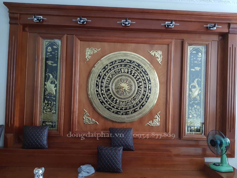 giá tranh mặt trống đồng